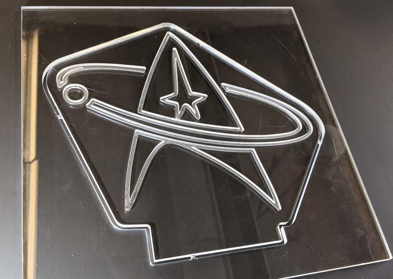 acrylic plastic engraving and cutting results on a cnc router