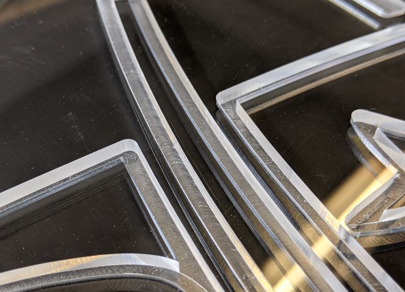 acrylic plastic engraving and cutting results on a cnc router