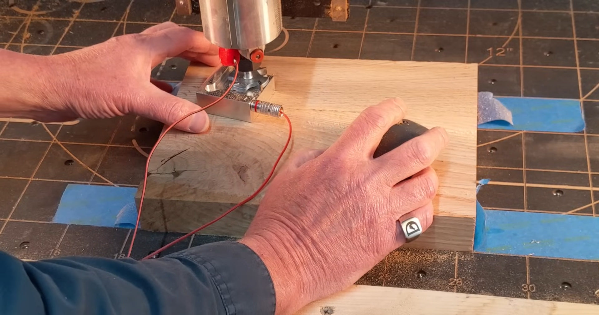 Garrett if IDC Woodcraft displays the proper way to make a zero probe touch the sensor on a flat slab project in CNC machine routers.