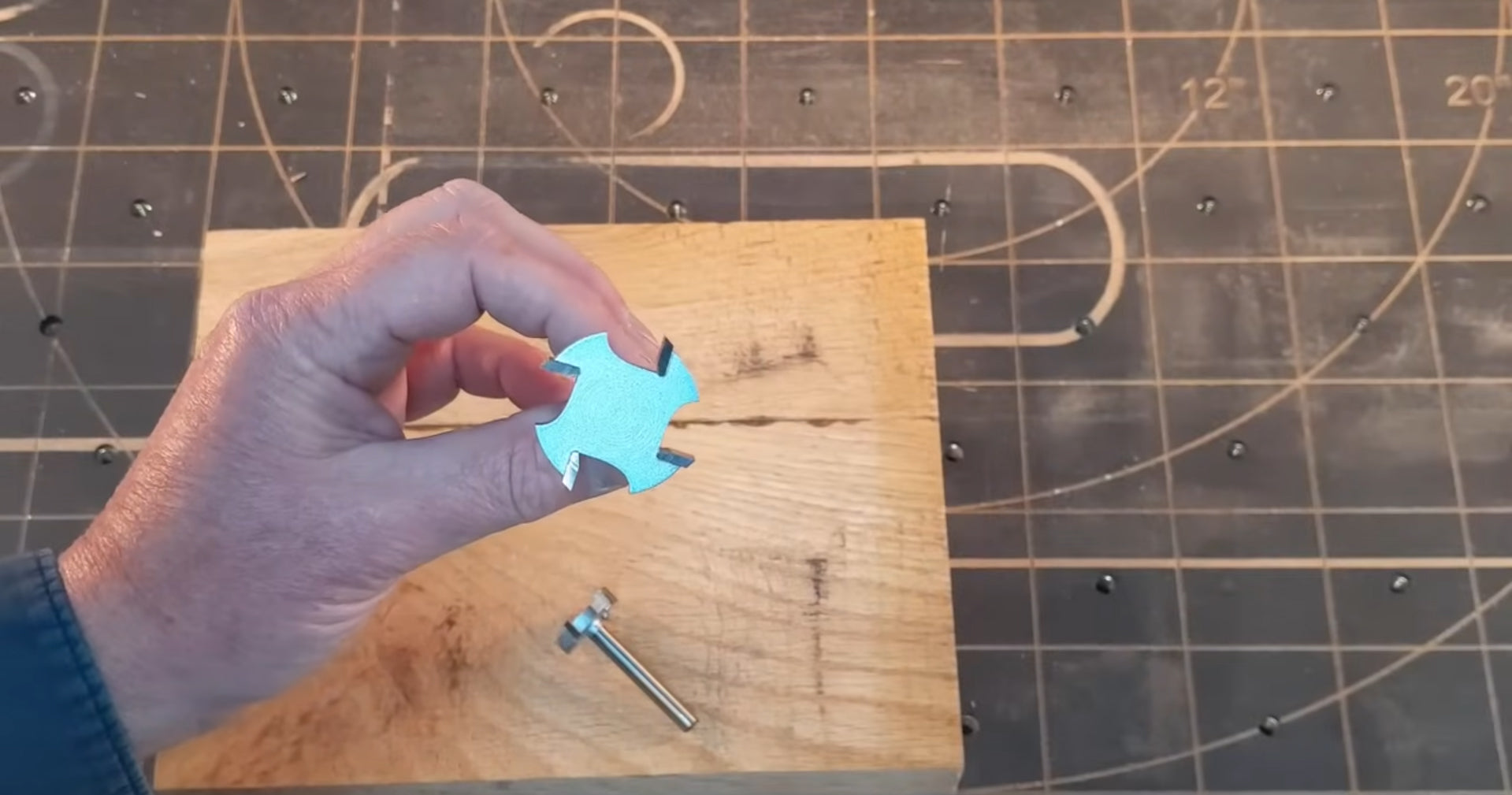 Garrett shows the custom IDC Woodcraft surfacing bit on a Longmill CNC Router.