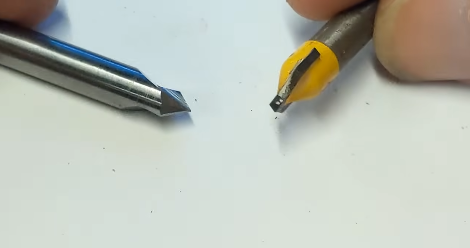 Two CNC Router bits being contrasted